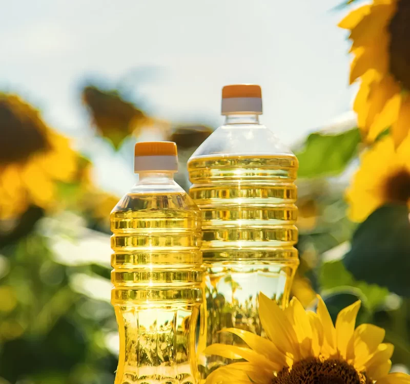 sunflower-oil-bottle-field-selective-focus-nature